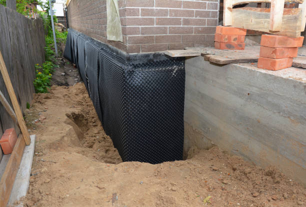 SJ Waterproofing Pros technician performing targeted Waterproofing assessment in Lewisburg, PA